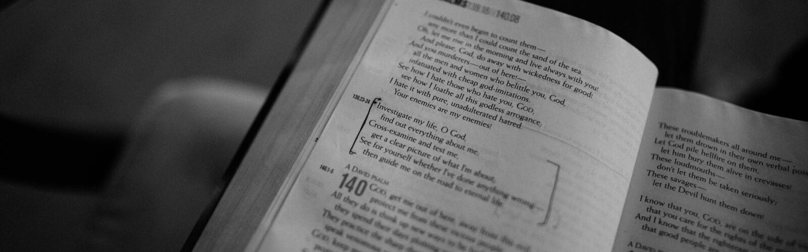 opened book with religious psalms